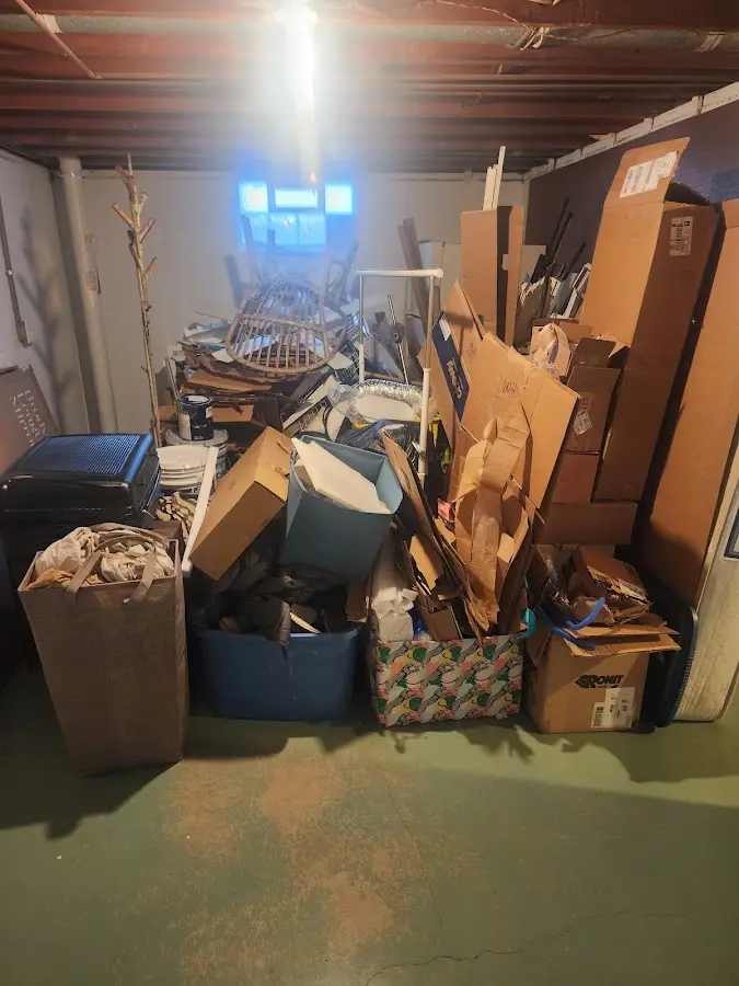 Roll-off dumpster container at job site for Yard Waste Dumpster Rental in Airmont